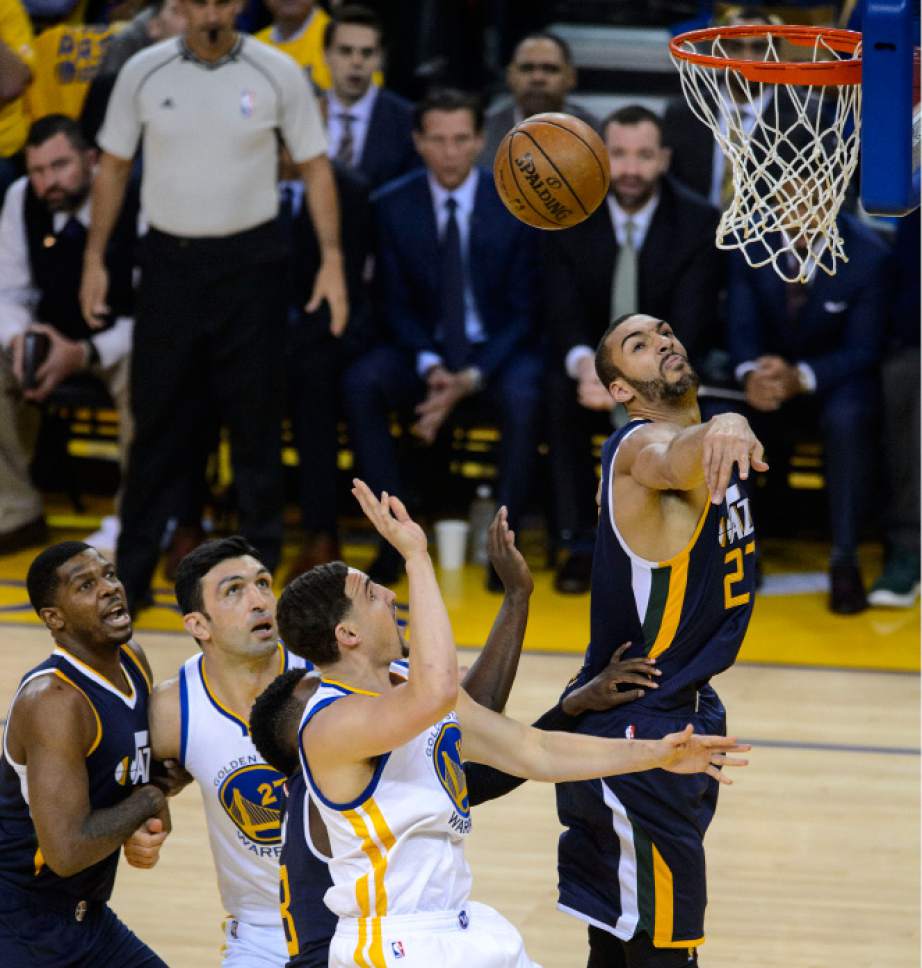 Steve Griffin  |  The Salt Lake Tribune


Utah Jazz center Rudy Gobert (27) blocks the shot of Golden State Warriors guard Klay Thompson (11) during game 2 of the NBA playoff game between the Utah Jazz and the Golden State Warriors at Oracle Arena in Oakland Thursday May 4, 2017.