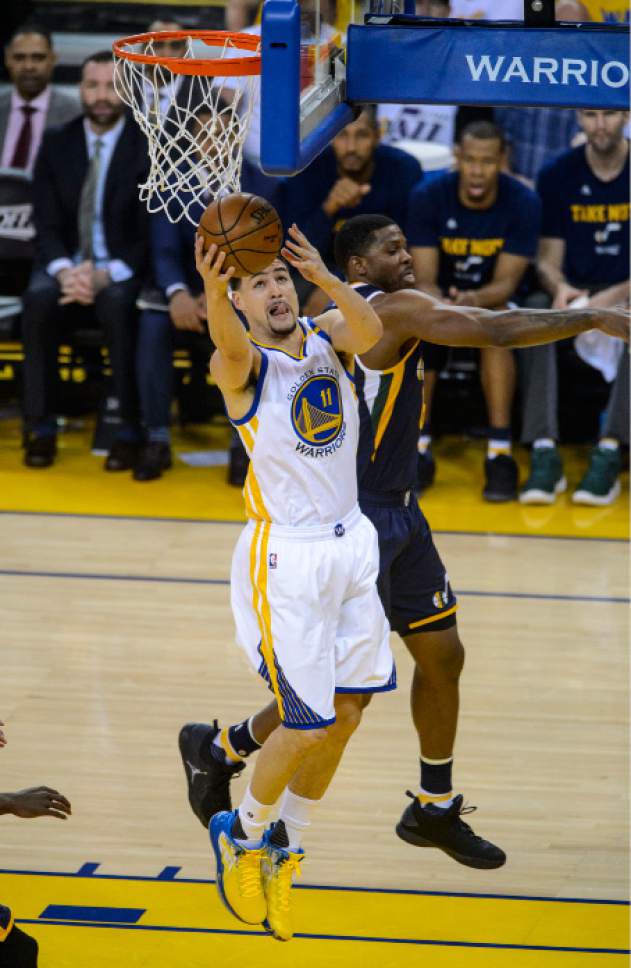 Steve Griffin  |  The Salt Lake Tribune


Golden State Warriors guard Klay Thompson (11) gets to the basket during game 2 of the NBA playoff game between the Utah Jazz and the Golden State Warriors at Oracle Arena in Oakland Thursday May 4, 2017.
