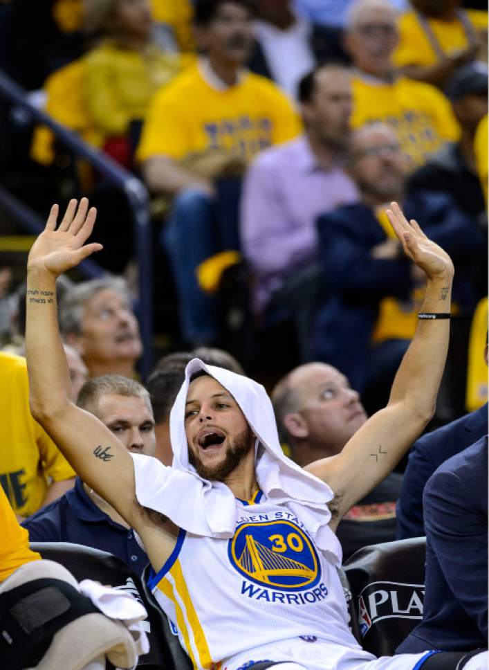 Steve Griffin  |  The Salt Lake Tribune


Golden State Warriors guard Stephen Curry (30) pumps his hands in the air as the Warriors build a big lead in the first half of game 2 of the NBA playoff game between the Utah Jazz and the Golden State Warriors at Oracle Arena in Oakland Thursday May 4, 2017.