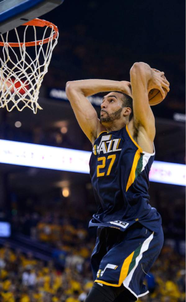 Steve Griffin  |  The Salt Lake Tribune


Utah Jazz center Rudy Gobert (27) glides to the basket as he gets ready dunk the ball during game 2 of the NBA playoff game between the Utah Jazz and the Golden State Warriors at Oracle Arena in Oakland Thursday May 4, 2017.