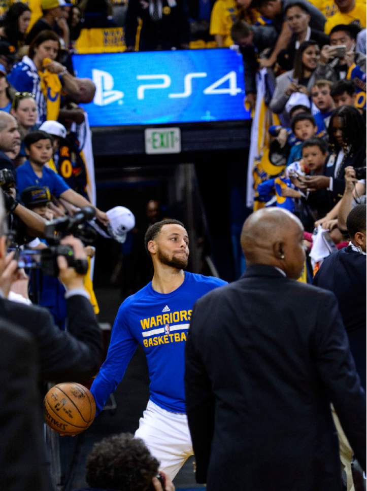 Steve Griffin  |  The Salt Lake Tribune


Golden State Warriors guard Stephen Curry (30) fires a full court shot from the team's tunnel prior to game 2 of the NBA playoff game between the Utah Jazz and the Golden State Warriors at Oracle Arena in Oakland Thursday May 4, 2017. Curry has a pre-game routine that includes the long shot.
