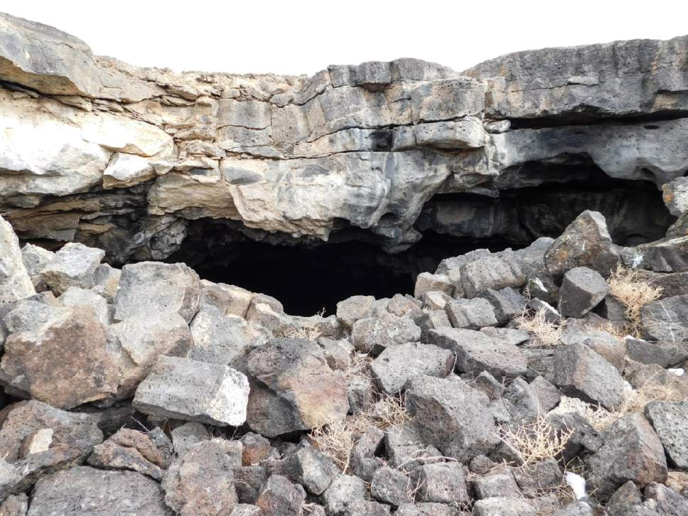 Erin Alberty  |  The Salt Lake Tribune


The entrance of a lava tube is visible at the end of a long, ditch-like basin near the parking loop at the end of Lava Tubes Road near Meadow in Millard County. Photo taken March 7, 2017.