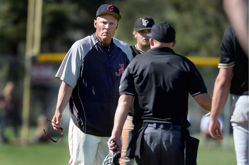 Scott Sommerdorf | The Salt Lake Tribune
American Fork's coach Jared Ingersoll is not happy about an interference call at first base giving Lone Peak a double play. Lone Peak beat American Fork 5-3, Friday, May 5, 2017.