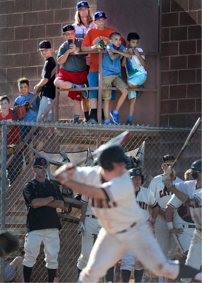 Scott Sommerdorf | The Salt Lake Tribune
Fans crowd a stairwell to get a look at the tense late innings as Lone Peak beat American Fork 5-3, Friday, May 5, 2017.