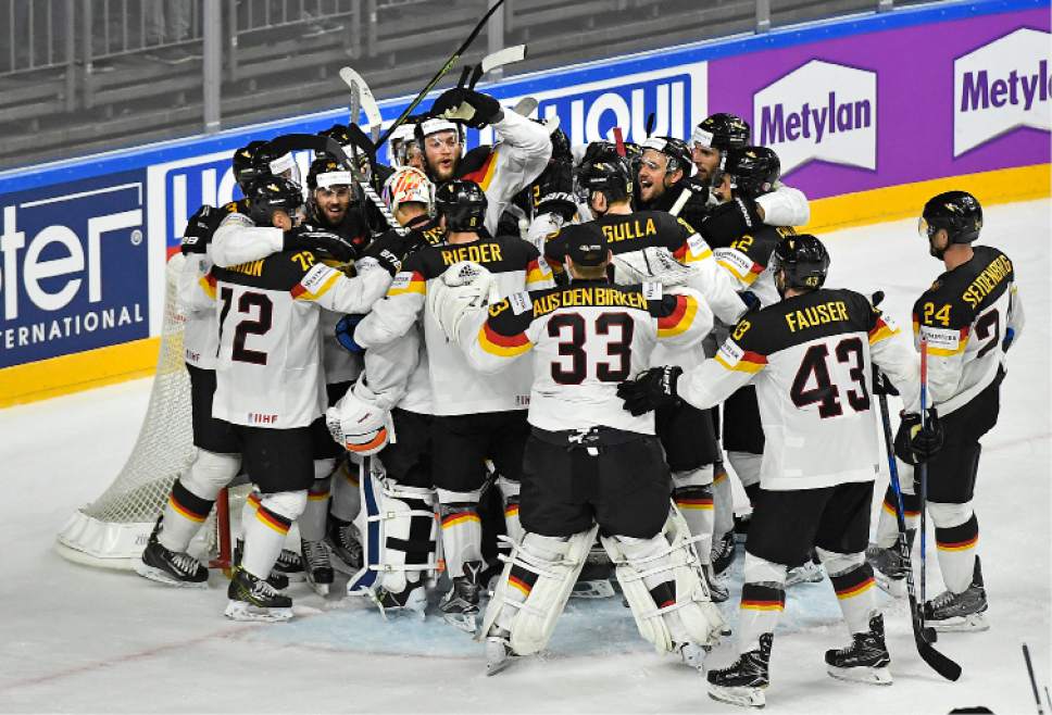 Hockey Germany stuns U.S. 21 at ice worlds; Canada, Russia win The