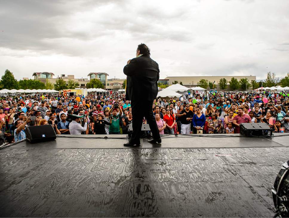 Trent Nelson  |  The Salt Lake Tribune
Singer Juan Gabriel performs at the Telemundo Utah Cinco de Mayo Festival in Centennial Park, West Valley City, Saturday May 6, 2017.