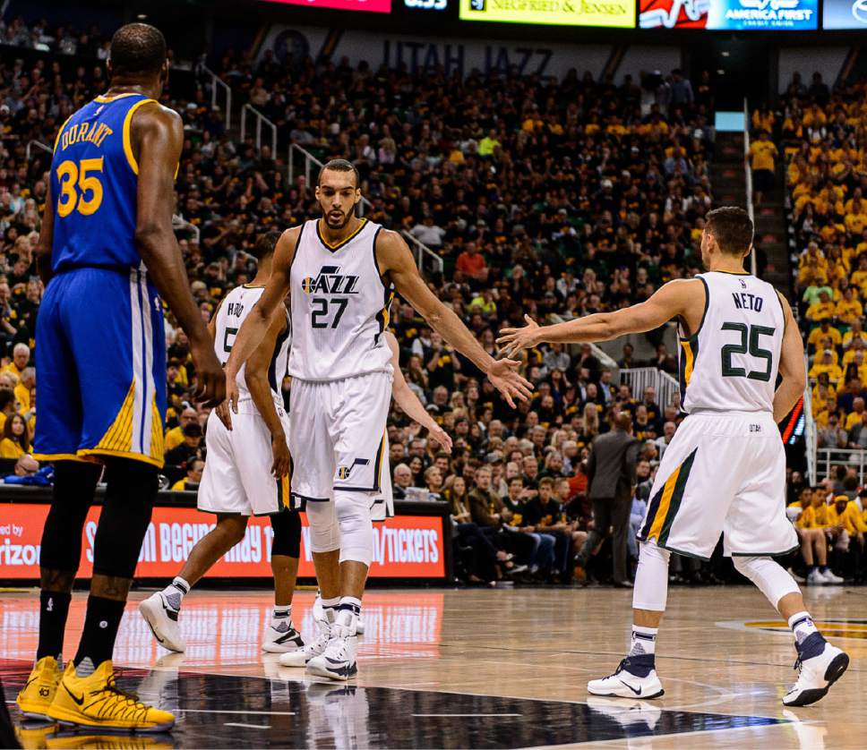 Trent Nelson  |  The Salt Lake Tribune
Utah Jazz center Rudy Gobert (27) and Utah Jazz guard Raul Neto (25) high-five as the Utah Jazz host the Golden State Warriors in Game 3 of the second round, NBA playoff basketball in Salt Lake City, Saturday May 6, 2017.