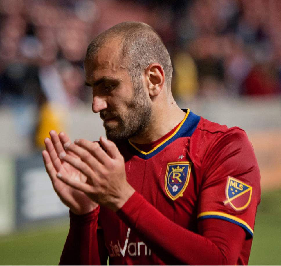 Michael Mangum  |  Special to the Tribune

Real Salt Lake forward Yura Movsisyan (14) sullenly applauds to the crowd following their 3-0 home loss to FC Dallas at Rio Tinto Stadium in Sandy, UT on Saturday, May 6, 2017.