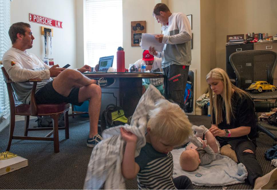 Leah Hogsten  |  The Salt Lake Tribune 
l-r Chase Dominguez, Andy Phillips, Greg Phillips and Andy's wife Megan Phillips tending to Max, 2, and Gus, 7 months as they wait for possible calls from the NFL draft. Sports agent Greg Phillips, who represents his son, University of Utah kicker Andy Phillips, and University of Utah long snapper Chase Dominguez, negotiated NFL contracts, Saturday, April 29, 2017 for the two men as undrafted free agents. Phillips signed with the Chicago Bears and Dominguez signed with the New Orleans Saints.