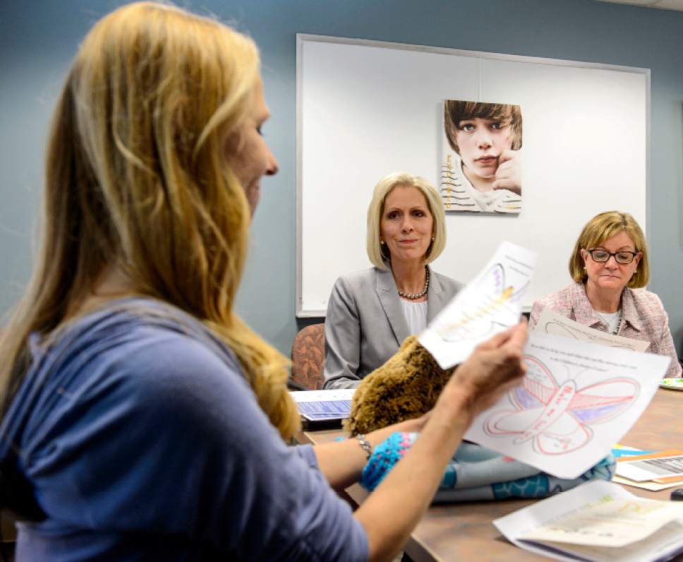Steve Griffin  |  The Salt Lake Tribune


Utah Children's Justice Center director Susanne Mitchell, left, reads notes written by children who have been helped by the centers to The Church of Jesus Christ of Latter-day Saints Primary General President, Joy D. Jones, and Young Women General President Bonnie L. Oscarson as the women toured the South Valley Children's Justice Center in West Jordan on Thursday April 20, 2017. The women leaders presented a $120,000 donation to enhance on-site medical services at eight Utah CJC locations.