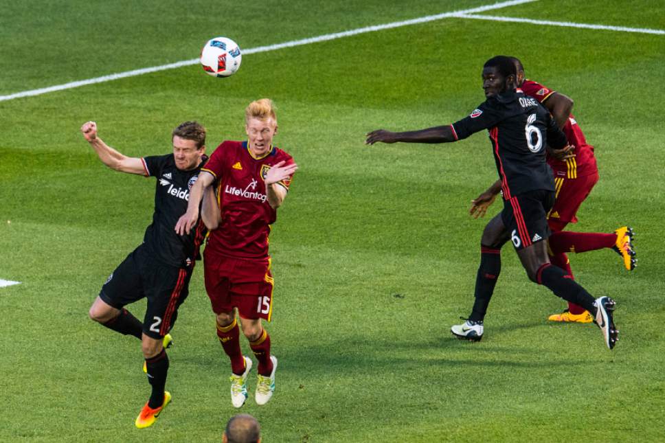 Chris Detrick  |  The Salt Lake Tribune
D.C. United defender Taylor Kemp (2) and Real Salt Lake defender Justen Glad (15) go for the ball during the game at Rio Tinto Stadium Friday July 1, 2016.
