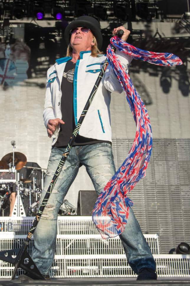 Rick Egan  |  The Salt Lake Tribune

Joe Elliott sings for Def Leppard as they play USANA Amphitheatre, Monday, June 23, 2014