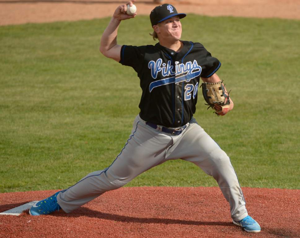 Leah Hogsten  |  The Salt Lake Tribune 
Pleasant Grove's relief pitcher Ty Lewis came in the bottom of the sixth inning. Lone Peak High School boys' baseball team defeated Pleasant Grove High School 8-5 during their game Monday, May 8, 2017.