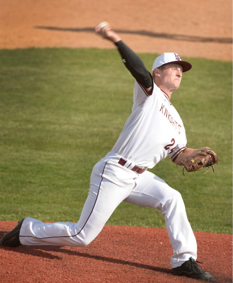 Leah Hogsten  |  The Salt Lake Tribune 
Lone Peak relief pitcher Kobe Freeman finished out the game. Lone Peak High School boys' baseball team defeated Pleasant Grove High School 8-5 during their game Monday, May 8, 2017.