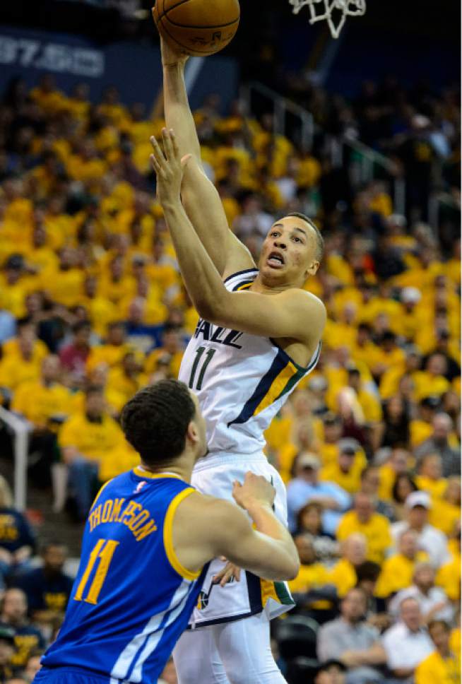 Steve Griffin  |  The Salt Lake Tribune


Utah Jazz guard Dante Exum (11) shoots over Golden State Warriors guard Klay Thompson (11) during game 4 of the NBA playoff game between the Utah Jazz and the Golden State Warriors at Vivint Smart Home Arena in Salt Lake City Monday May 8, 2017.