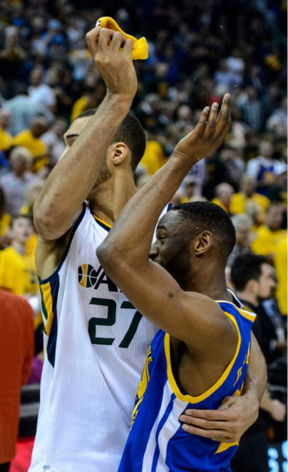 Steve Griffin  |  The Salt Lake Tribune


Utah Jazz center Rudy Gobert (27) hugs Golden State Warriors guard Ian Clark (21), and former Jazz teammate, as he takes Clark's head band and throws it into the crowd as the Jazz fell to the Warriors in game 4 of the NBA playoffs at Vivint Smart Home Arena in Salt Lake City Monday May 8, 2017.