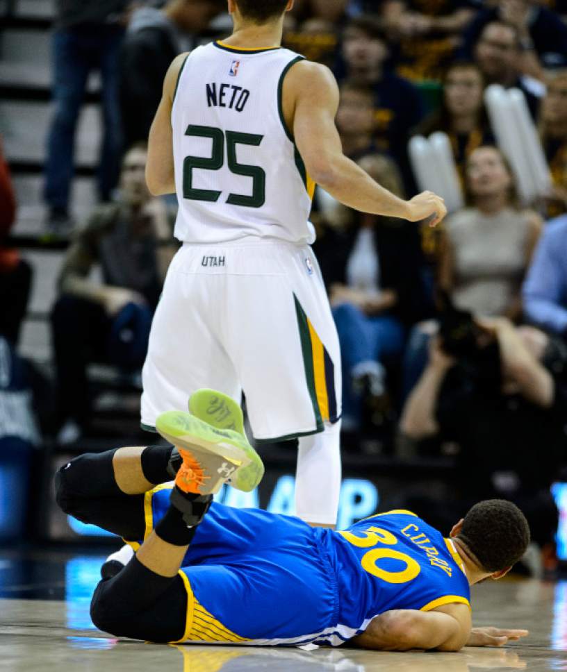 Steve Griffin  |  The Salt Lake Tribune


Golden State Warriors guard Stephen Curry (30) crashes to the floor after being fouled by Utah Jazz guard Raul Neto (25) during game 4 of the NBA playoff game between the Utah Jazz and the Golden State Warriors at Vivint Smart Home Arena in Salt Lake City Monday May 8, 2017.