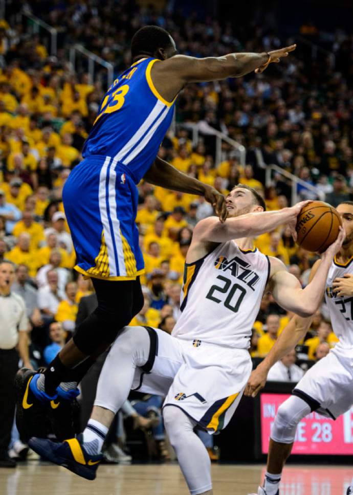 Steve Griffin  |  The Salt Lake Tribune


Golden State Warriors forward Draymond Green (23) jumps over Utah Jazz forward Gordon Hayward (20) during game 4 of the NBA playoff game between the Utah Jazz and the Golden State Warriors at Vivint Smart Home Arena in Salt Lake City Monday May 8, 2017.