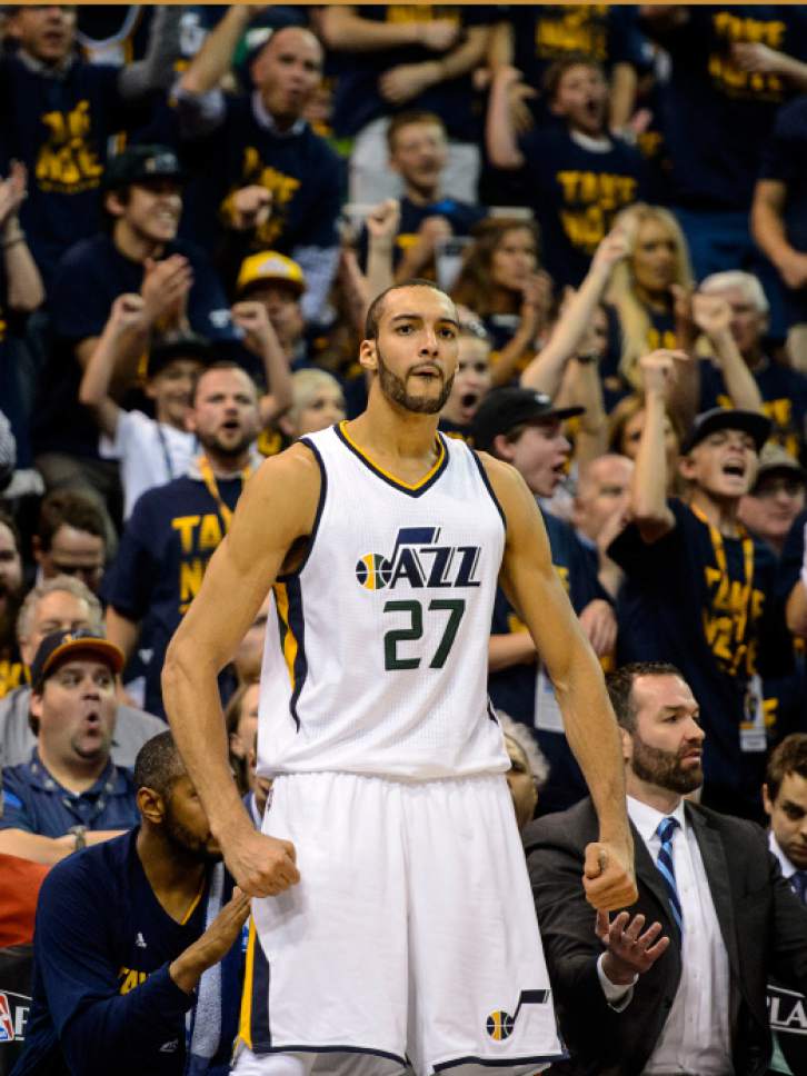 Steve Griffin  |  The Salt Lake Tribune


Utah Jazz center Rudy Gobert (27) gets pumped up as he jumps off the bench after a Utah Jazz guard Dante Exum (11) slam dunk during game 4 of the NBA playoff game between the Utah Jazz and the Golden State Warriors at Vivint Smart Home Arena in Salt Lake City Monday May 8, 2017.