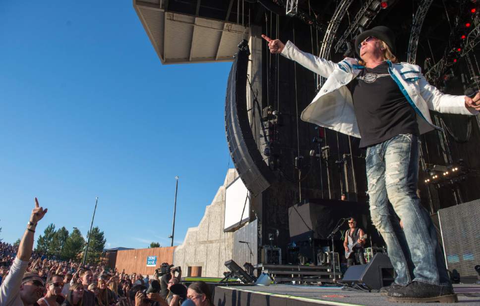 Rick Egan  |  The Salt Lake Tribune

Joe Elliott sings for Def Leppard at Usana Amphitheatre, Monday, June 23, 2014