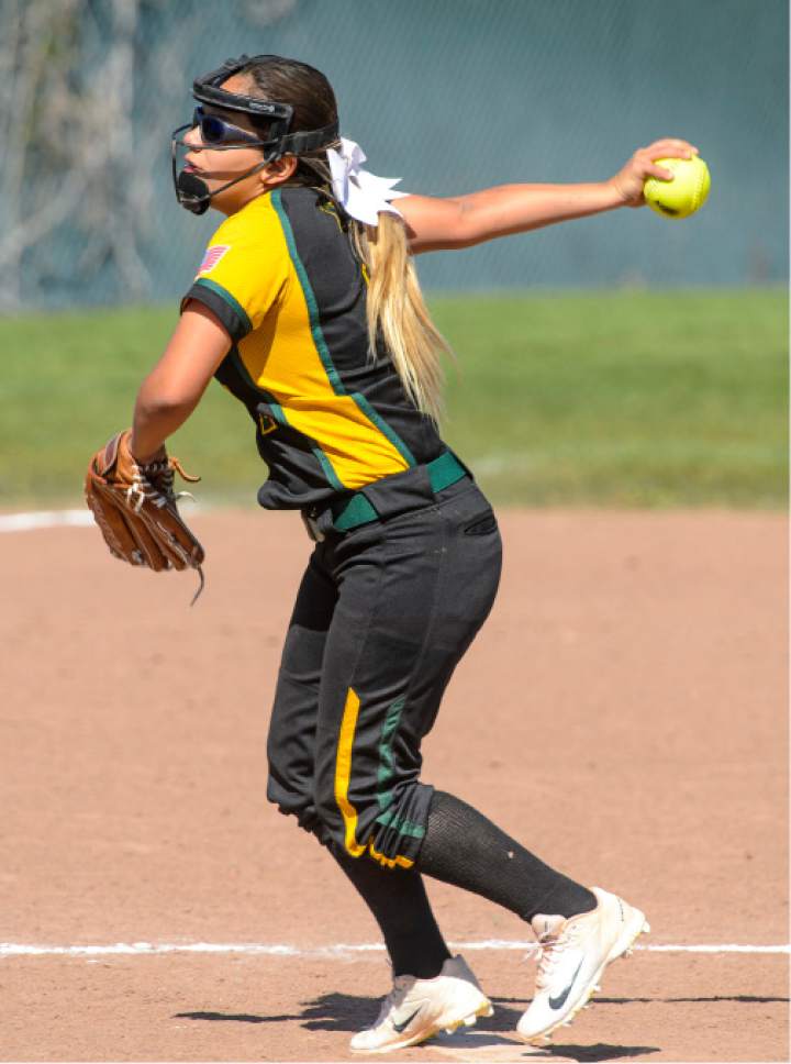 Steve Griffin  |  The Salt Lake Tribune


Kearns pitcher Angel Valdez delivers a pitch to the plate during the Cyprus versus Kearns softball game  in Kearns Tuesday May 9, 2017.