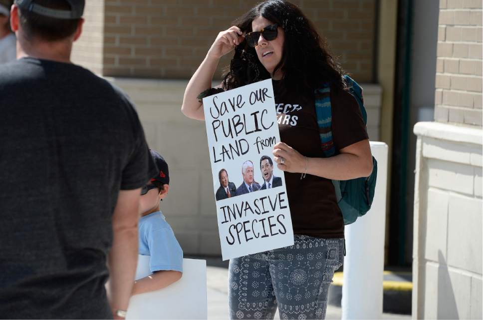Scott Sommerdorf | The Salt Lake Tribune
Protestors chanted in favor of the Bears Ears Monument as cars left the Gateway Shopping Mall near the BLM offices. They were hoping to get a glimpse of Secretary of the Interior Ryan Zinke who spoke at a brief press conference after having met with members of the Bears Ears Commission Sunday at the Bureau of Land Management office at the Gateway in Salt Lake City, Sunday, May 7, 2017.