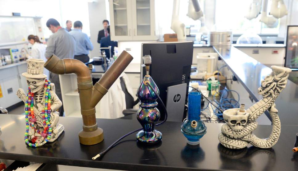 Al Hartmann  |  The Salt Lake Tribune
Marijauana water pipes (bongs) on display at the new Utah State Crime Lab's chemistry room where possible illegal substances are analyzed. The Utah Department of Public Safety issued a special hazard warning to the public about new trends in street drugs across Utah. The crime laboratory has identified a single tablet that appears to be illicitly manufactured and contains multiple hazardous compounds. Several of the identified components are potentially 100 times stronger than morphine.