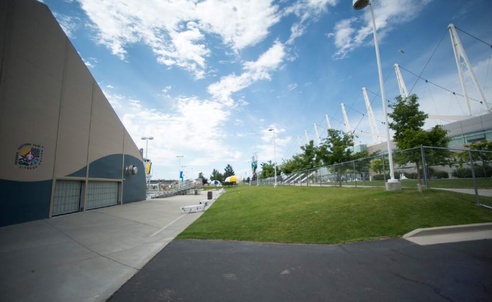 Rick Egan  |  The Salt Lake Tribune

The Oquirrh Park Fitness Center  (left) and the Olympic Oval in Kearns (right), Friday, July 17, 2015. There is a plan to build a building that will connect the Oquirrh Park Fitness Center with the Utah Olympic Oval, providing more space for Fitness Center personnel, oval bosses, US Speedskating athletes and officials and others to carry out their activities.