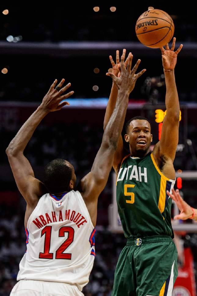 Trent Nelson  |  The Salt Lake Tribune
Utah Jazz guard Rodney Hood (5) passes the ball, with LA Clippers forward Luc Mbah a Moute (12) defending, as the Utah Jazz face the Los Angeles Clippers in Game 7 at STAPLES Center in Los Angeles, California, Sunday April 30, 2017.