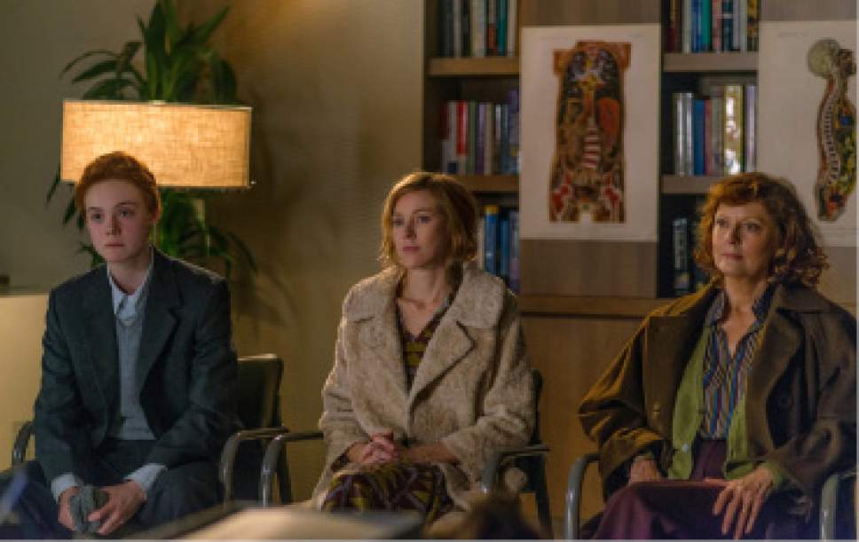 Ray (Elle Fanning, left), a trans teen boy, hears from a doctor about his transitioning, alongside his mother Maggie (Naomi Watts, center) and grandmother Dolly (Susan Sarandon), in the drama "3 Generations." Courtesy The Weinstein Company