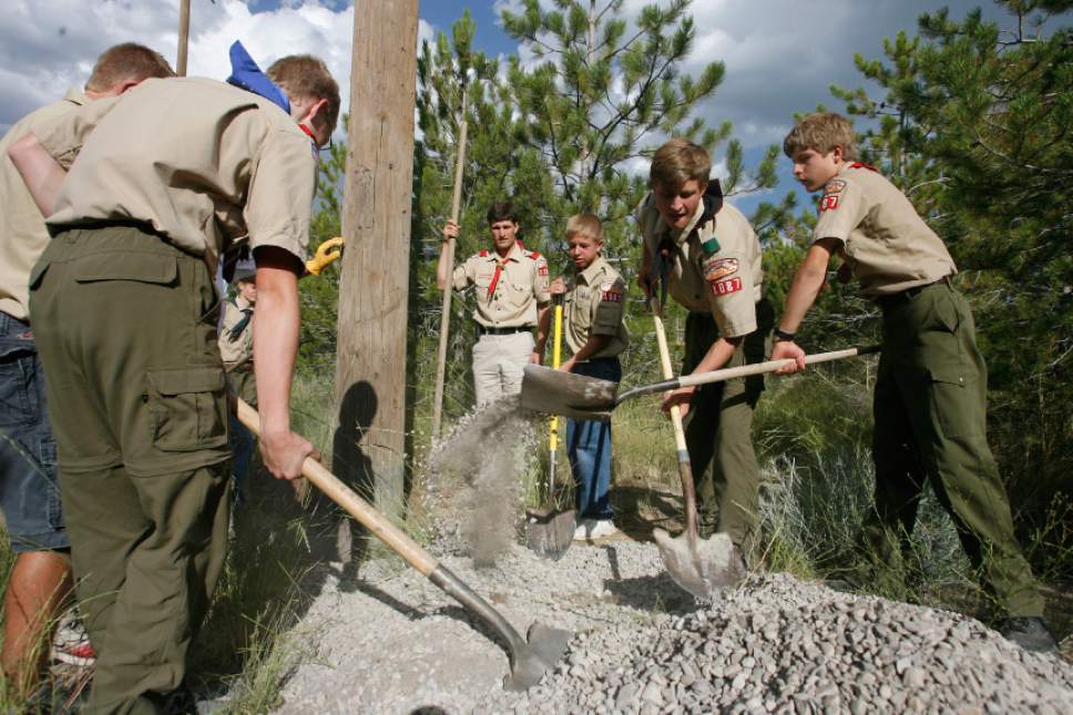 Rick Egan   | Tribune file photo                                                                                                                                                                                                                Scouts from Eagle Mountain work on a service project in this 2010 file photo.