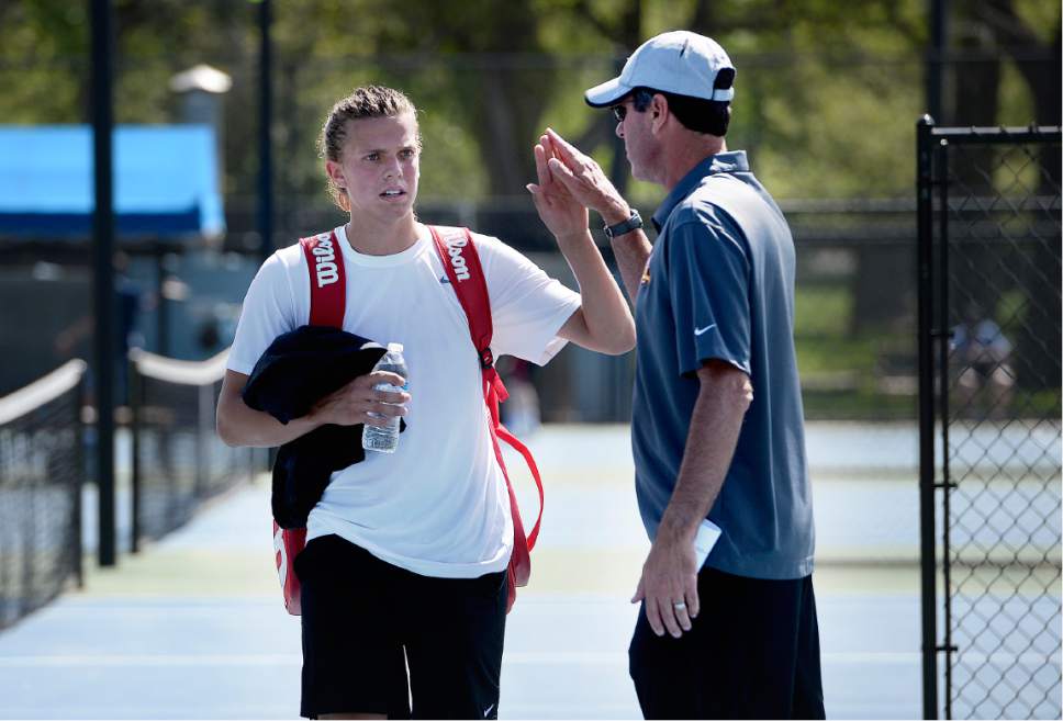 Scott Sommerdorf | The Salt Lake Tribune
Viewmont's Jack Taylor gets a high five from head coach Mark Burningham after he defeated Ethan Dubil of West in the semi-finals of the #1 singles tournament at Liberty Park, Wednesday, May 10, 2017.
