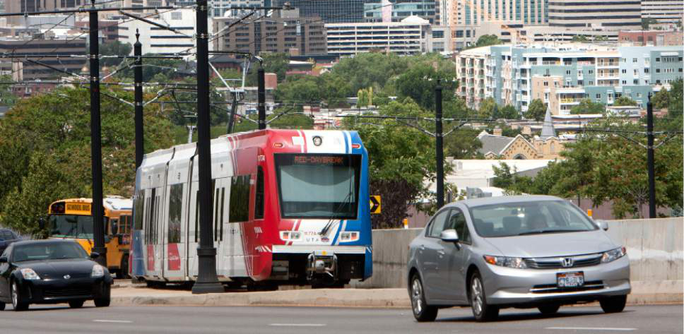 Steve Griffin |  Tribune file photo

A UTA TRAX train climbs out of downtown Salt Lake City as it heads to the University of Utah in Salt Lake City on Monday June 24, 2013.