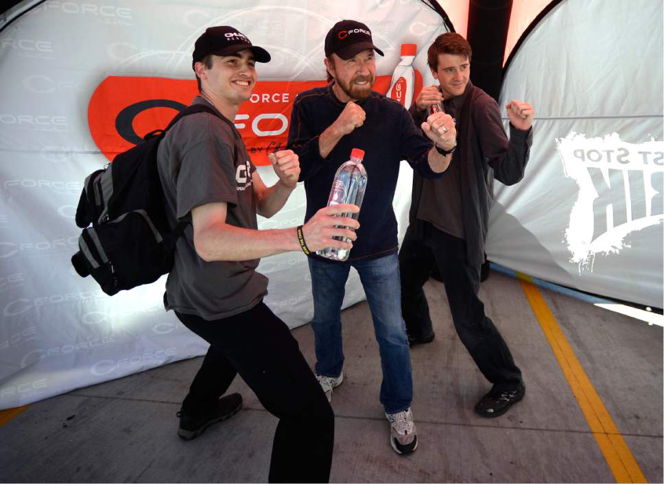 Scott Sommerdorf | The Salt Lake Tribune
Adam Halsell, left and Jaren Halsell poise with actor Chuck Norris during an appearance at the State Street Maverick in Provo, Thursday, May 10, 2017.
