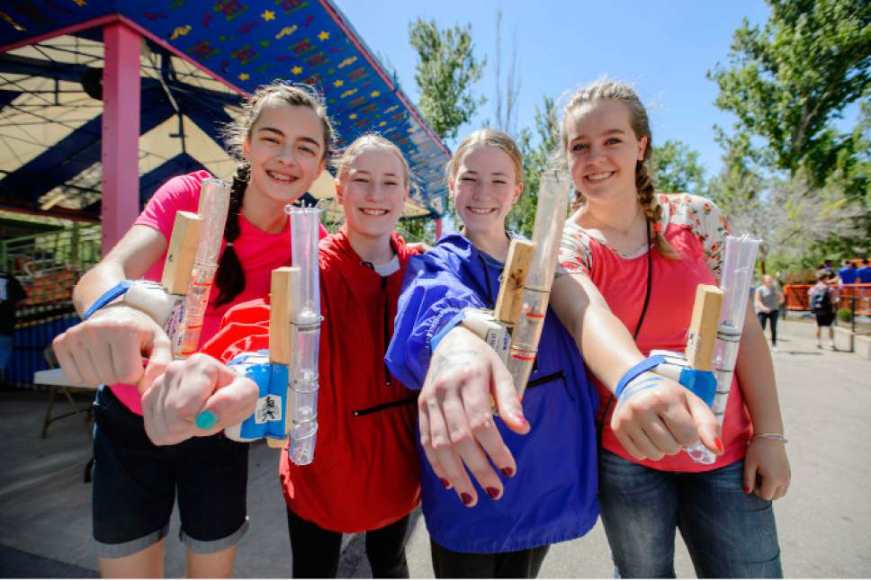 Steve Griffin  |  The Salt Lake Tribune

Churchill Junior High School eighth-graders Rachel Wagner, Halle Wardro, Kate Wardrop and Cambri Anderton wear accelerometers on their wrists as they prepare to ride Lagoon's Colossus during the Farmington theme park's Physics Day on Friday, May 12, 2017.