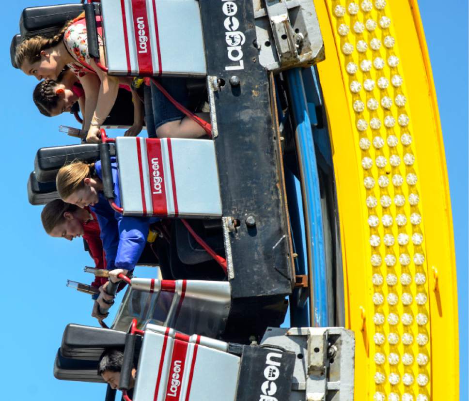 Steve Griffin  |  The Salt Lake Tribune

Churchill Junior High School eighth-graders Halle Wardro, Kate Wardrop, Rachel Wagner and Cambri Anderton wear accelerometers on their wrists while riding the Colossus rollercoaster at Lagoon during the Farmington theme park's Physics Day on Friday, May 12, 2017.