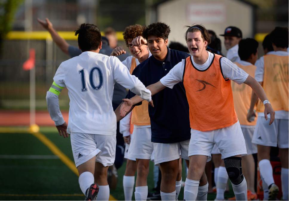Scott Sommerdorf | The Salt Lake Tribune
The Juan Diego bench gives congratulations to Ruben Castillo after he scored again to give Juan Diego a 2-0 lead. Juan Diego defeated Logan 3-1 in a 3A boy's semi-final, Friday, May 12, 2017.