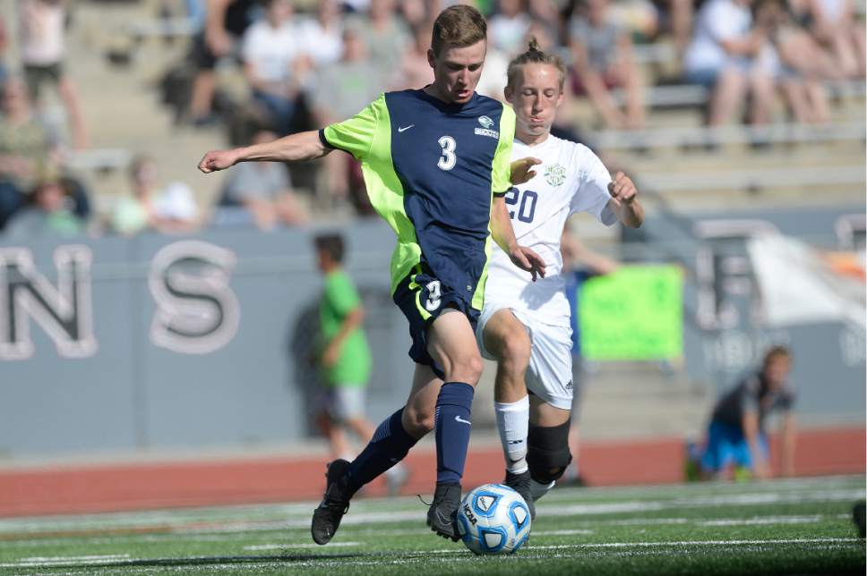 Scott Sommerdorf | The Salt Lake Tribune
Ridgeline's Houston Gueltier, left, and Snow Canyon's Kirk Brown battle for control of the ball during second half play as Ridgeline beat Snow Canyon 2-1 in a 3A boy's semi-final, Friday, May 12, 2017.