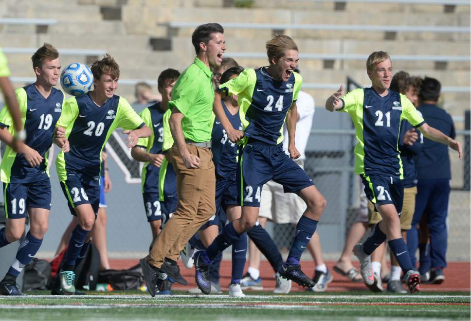 Scott Sommerdorf | The Salt Lake Tribune
Ridgeline's bench erupts as the game ends and Ridgeline beats Snow Canyon 2-1 in a 3A boy's semi-final, Friday, May 12, 2017.