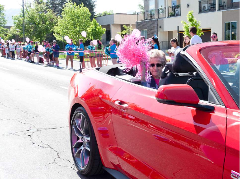 Michael Mangum  |  Special to The Tribune

Elaine Burger, a 53 year cancer survivor, cheers from the pace car during the Susan G. Komen Race for the Cure in Salt Lake City on Saturday, May 13, 2017.