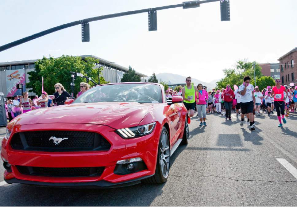 Michael Mangum  |  Special to The Tribune

Runners take off from the starting line behind the pace car during the Susan G. Komen Race for the Cure in Salt Lake City on Saturday, May 13, 2017.