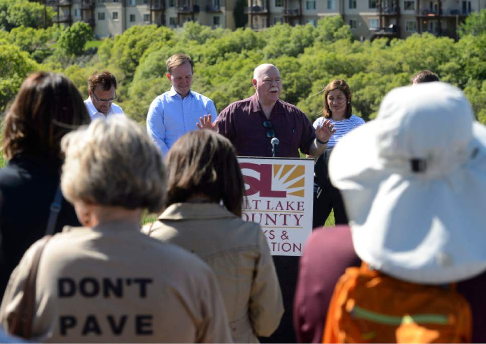 Steve Griffin  |  The Salt Lake Tribune


Sandy Mayor Tom Dolan, center, is joined by Salt Lake County Mayor Ben McAdams, County Councilman Max Burdick and a group of residents and users of Dimple Dell Regional Park to announce an agreement to invest $4 million from county bond funds in improvements to the park and to address the desire by some users not to pave the North Rim Trail during a press conference in Sandy Friday May 12, 2017.