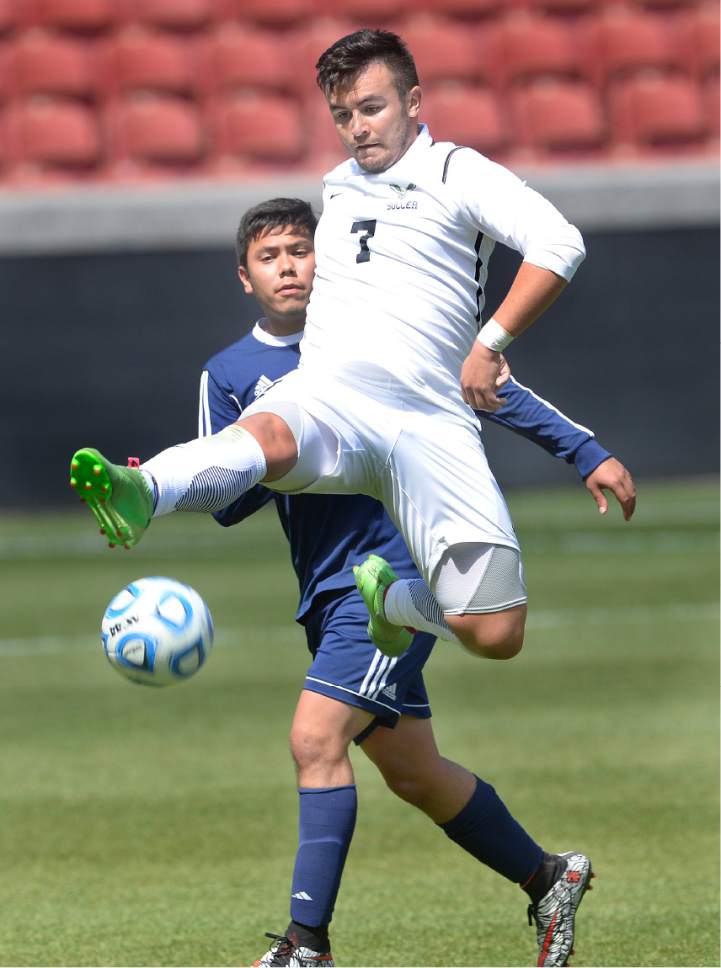 Scott Sommerdorf | The Salt Lake Tribune
Alex Cruz of Ridgeline goes up to get a ball in front of Ruben Castillo of Juan Diego during second half play. Ridgeline beat Juan Diego 2-1 in 2 OT to win the 3A state soccer championship, Saturday, May 13, 2017.