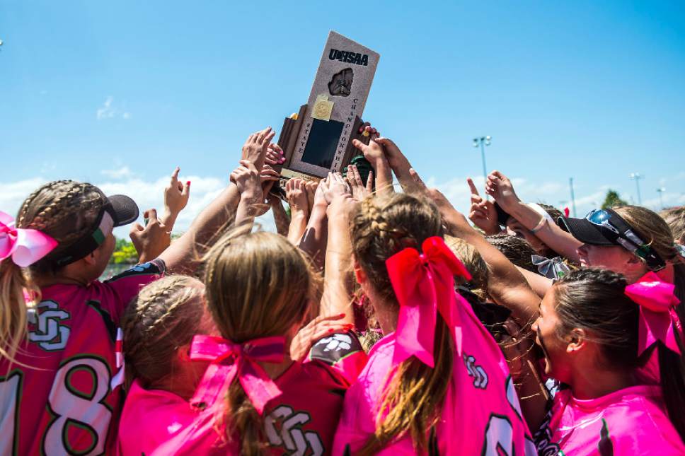 Chris Detrick  |  The Salt Lake Tribune
Members of the South Summit softball team celebrate after wining the Class 2A state softball championship game at Spanish Fork Complex Saturday, May 13, 2017. South Summit defeated Beaver 9-1.