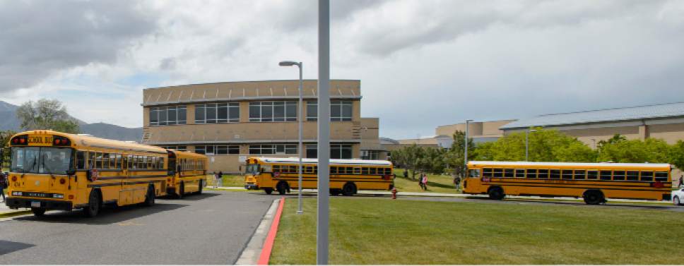 Steve Griffin  |  The Salt Lake Tribune


School busses leave Matheson Junior High School in Magna, Utah Tuesday May 16, 2017.