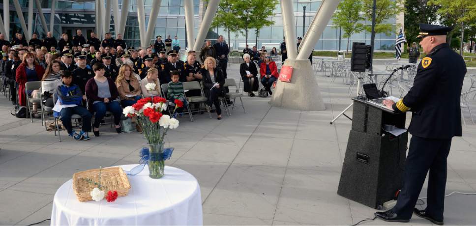 Al Hartmann  |  The Salt Lake Tribune
Salt Lake Police Chief Mike Brown speaks to officers and family members at sunrise service Tuesday May 16 that honored and payed tribute to 25 Salt Lake City's fallen police officers over the years.