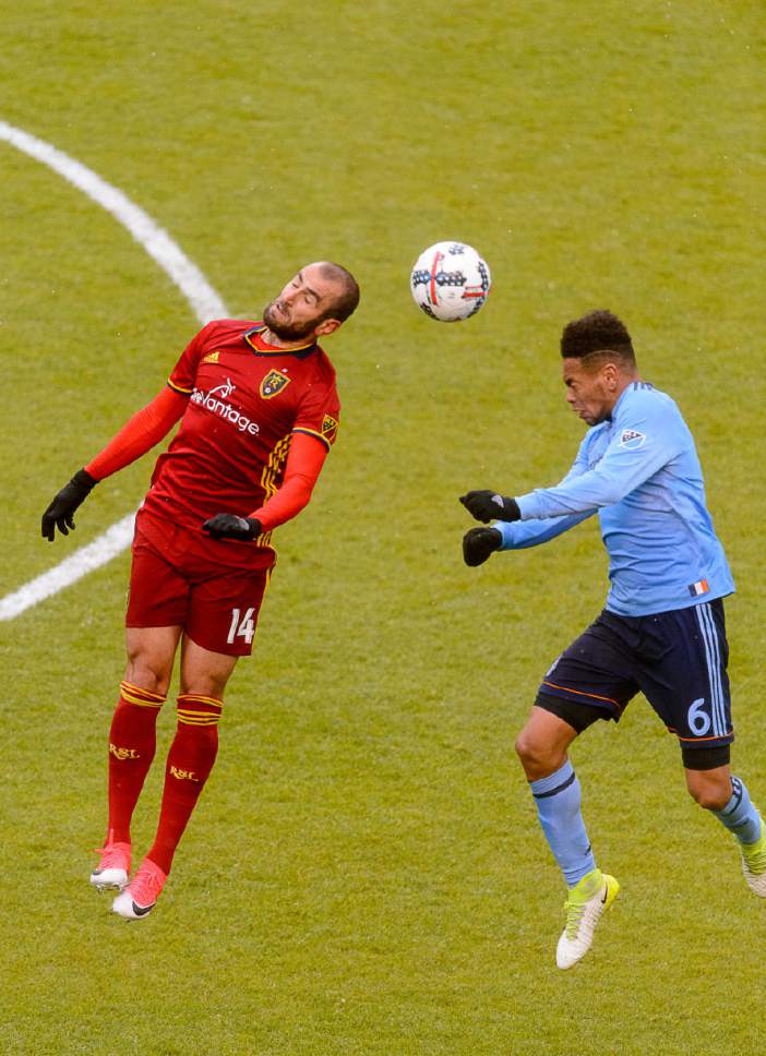 Trent Nelson  |  The Salt Lake Tribune
Real Salt Lake forward Yura Movsisyan (14) heads the ball, with New York City FC defender Alexander Callens (6) at right. Real Salt Lake vs. New York City FC at Rio Tinto Stadium in Sandy, Wednesday May 17, 2017.