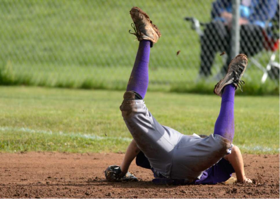 Steve Griffin  |  The Salt Lake Tribune


Riverton's Madison Tuft falls to the dirt as she dives for a line drive during the Class 5A softball playoff opener between Riverton and Copper Hills in West Jordan Tuesday May 16, 2017.