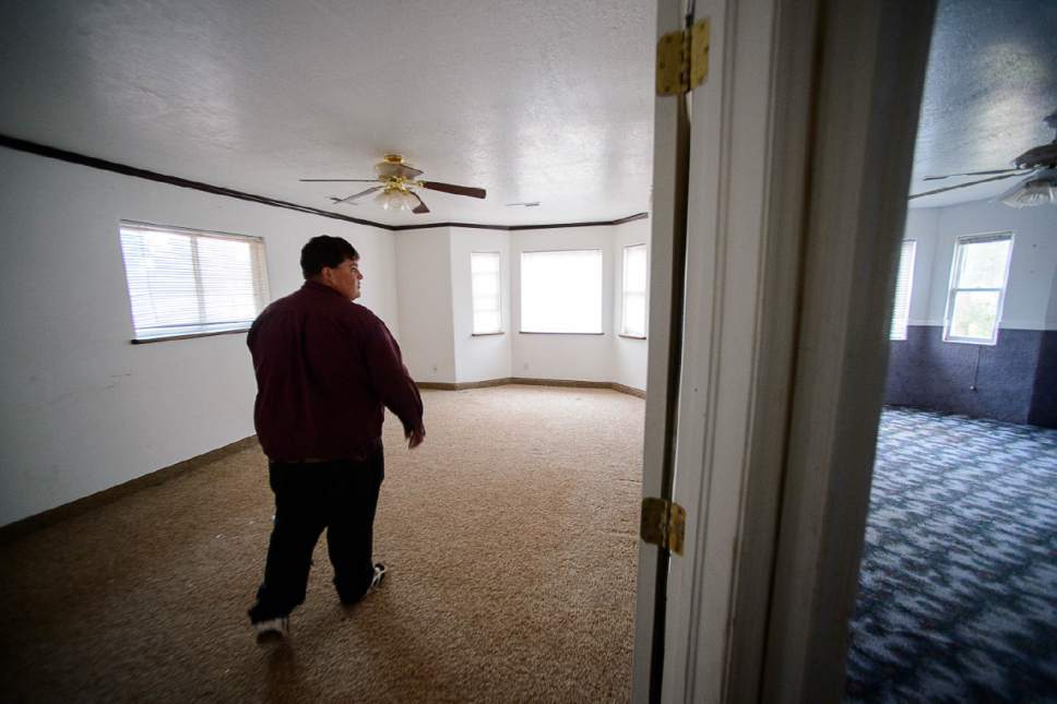 Trent Nelson  |  The Salt Lake Tribune
Marvin Darger walks through what had been his bedroom about an hour before his family would be locked out of the Colorado City, AZ, home, Wednesday May 10, 2017. The UEP Trust took control of many Colorado City properties this week after years of non-cooperation from FLDS families. Religious beliefs of the FLDS prevented them from signing occupancy agreements with the trust. The room on the right was used for a homeschool.
