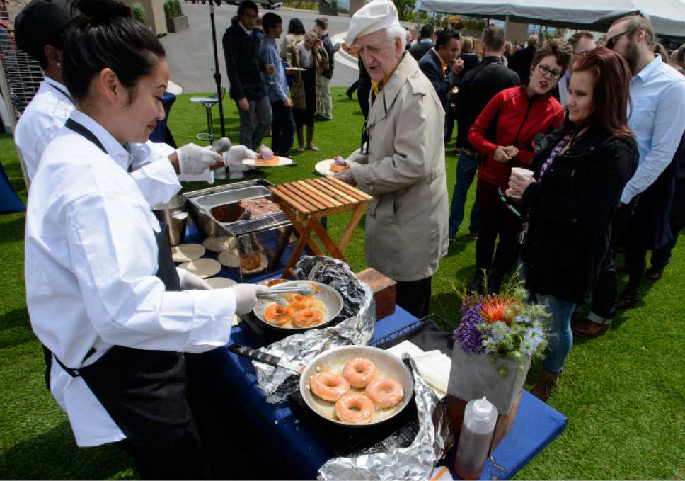 Steve Griffin  |  The Salt Lake Tribune


More than 850 BioFire employees, local dignitaries and building contractors celebrate the opening of BioFire Diagnostics, LLC, (a bioMérieux company) at their new home in Research Park in new home Salt Lake City Wednesday May 17, 2017. Fried donuts with gelato were served on their outside patio.